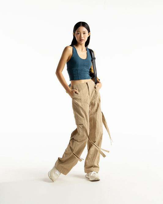 CHIEU TA PANTS - wrinkled parachute windbreaker straight-leg pants with front darts, asymmetrical pockets with string ties, and elastic waistband - ASTOUD, PROFILEMOMO.